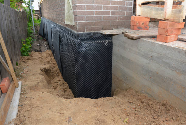 SJ Waterproofing Pros technician performing targeted Emergency Waterproofing assessment in Dale, PA